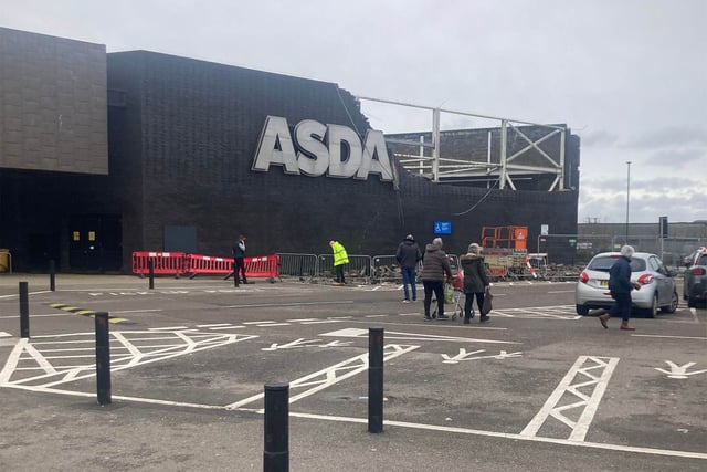 Section of exterior wall at Asda superstore building collapses