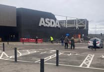 Section of exterior wall at Asda superstore building in Hayle collapses