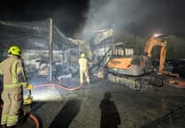 Fire crews tackle large blaze at commercial shed in Roche