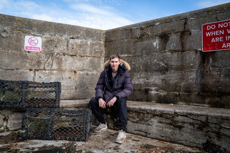 Kieron English was walking along the coast path at Newquay when it collapsed.  February 3, 2026.  //  A man told how he escaped death 'by inches' after narrowly avoiding a huge cliff landslide - with seconds to spare. Kieron English, 20, was walking along a path with friend Rian Walker when a section of the cliff crashed down in front of them without warning.  Minutes into their walk, they heard a "high pitched squeal" - and turned to see tonnes of soil and rock collapse just five feet behind them.  The pair, three other walkers and two dogs, were trapped "with no way of getting out" and had to be rescued by a lifeboat crew. 