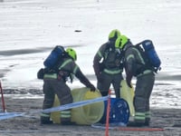 Blue plastic drum washed up on beach sparks response