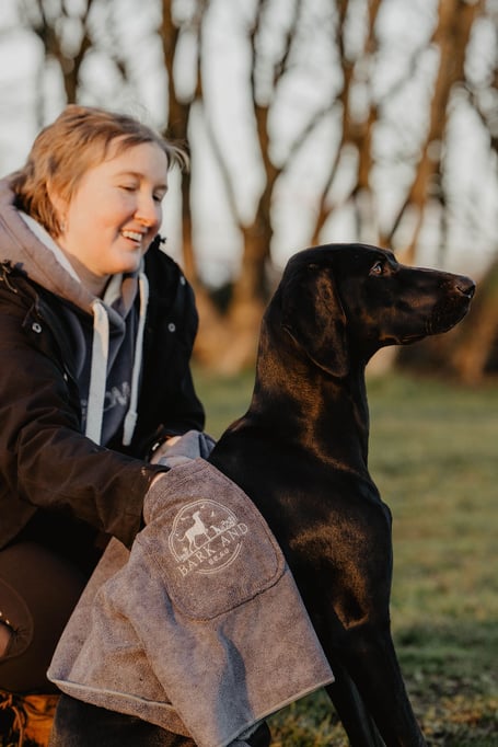 Leanne using the dog drying towel she developed on Darcy