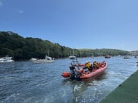 Lifeboat assists occupants of stranded vessel