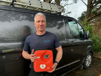 Defibrillator installed thanks to community campaign