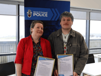 Mother and son recognised for helping improve neurodivergent support