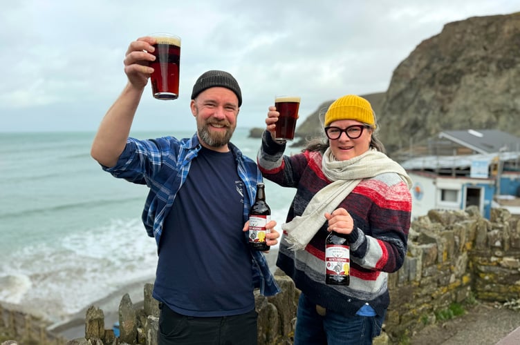 Driftwood Spars' head brewer Tim Lawrence and landlady Lou Treseder celebrate gold with a pint of Alfie's Revenge