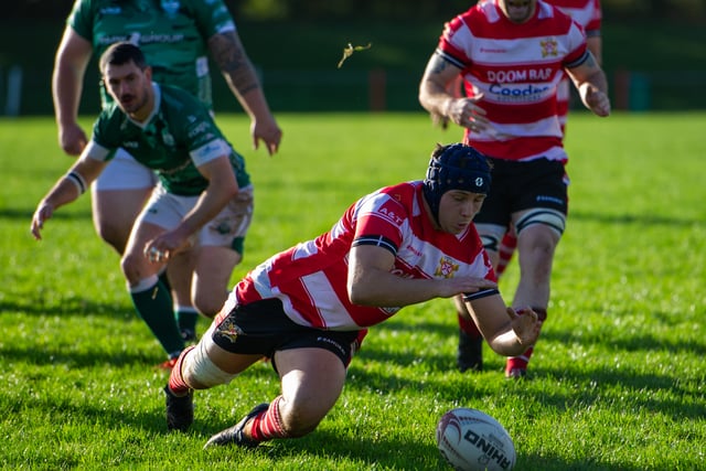 Saints withstand late comeback to secure hard-fought victory