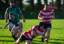 Saints withstand late comeback to secure hard-fought victory