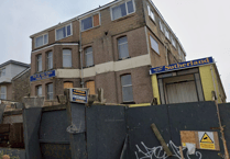 Action to secure former hotel following squatter complaints