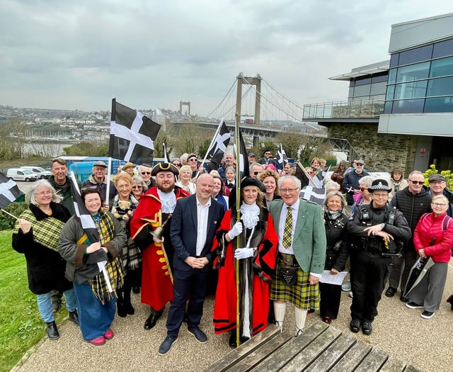 Bridge walk and songs mark St Piran’s Day in Saltash