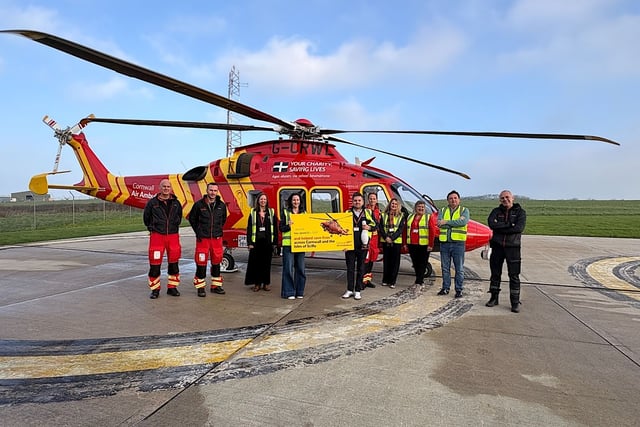 Staff mark over 10 years of backing for air ambulance