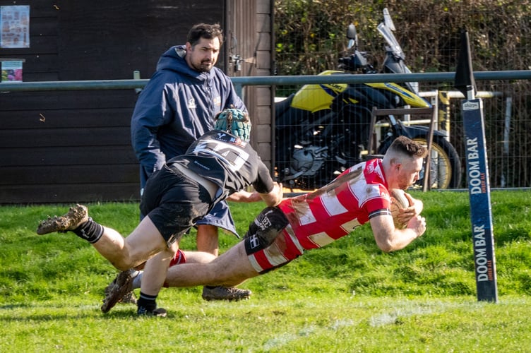 St Austell winger Max Bullen crashes over for a try in his side's Regional One South West victory at Launceston (Picture: Graham Walker/St Austell RFC)
