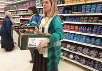 Take Back Power supporters redistribute food from Truro supermarket