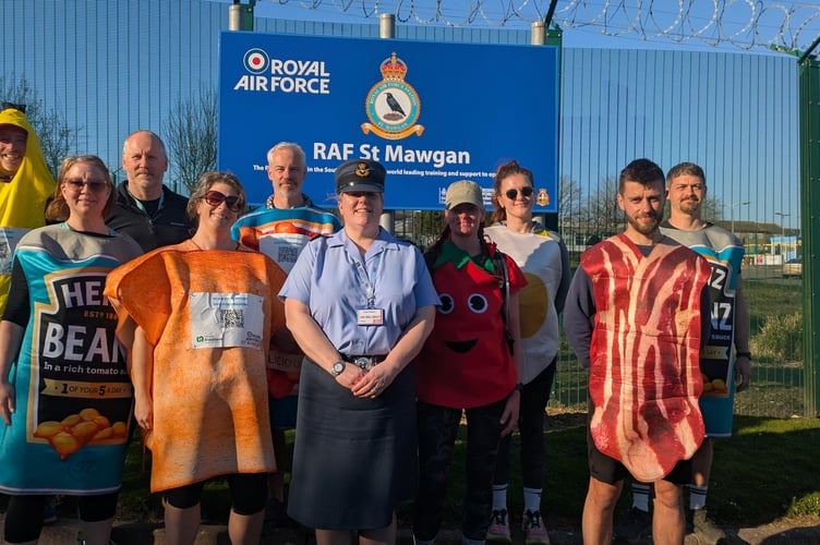 The team with RAF St Mawgan Station Commander Helen Simpson after completing their walk (Picture: Warren Wilkins)