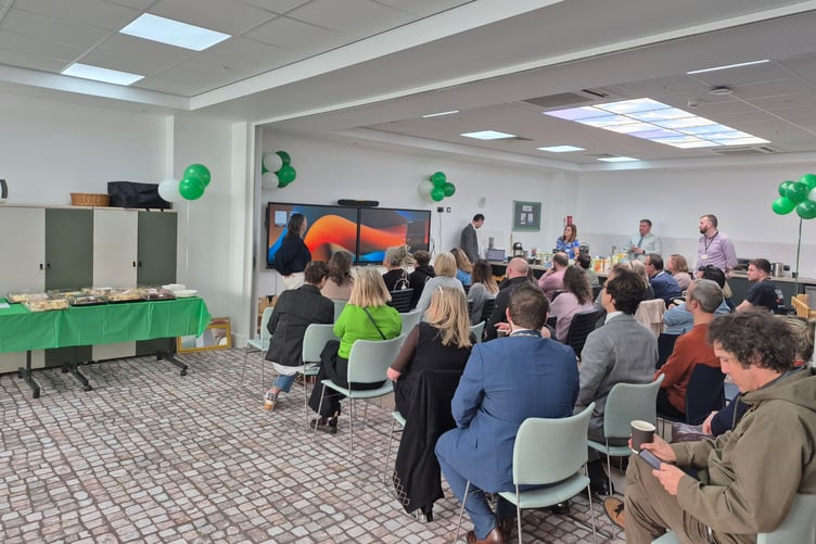 People gathered at Chi Austel for the launch of the new hub.