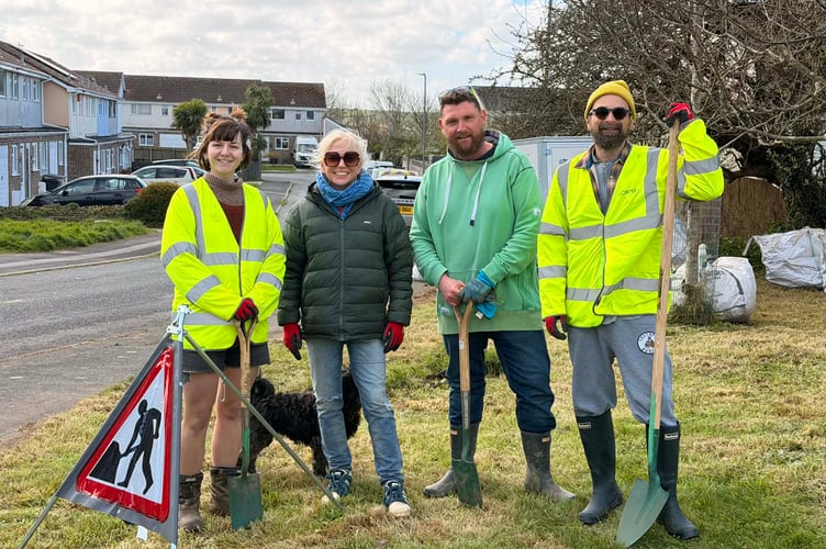 Volunteers carried out weeding and raking to improve the green areas