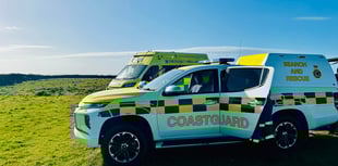 Young woman on cliff brought to safety 