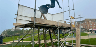Surfer of the South sculpture installed 