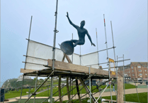 Surfer of the South sculpture installed
