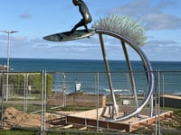 Surfer of the South sculpture installed 