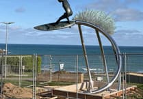 Surfer of the South sculpture installed