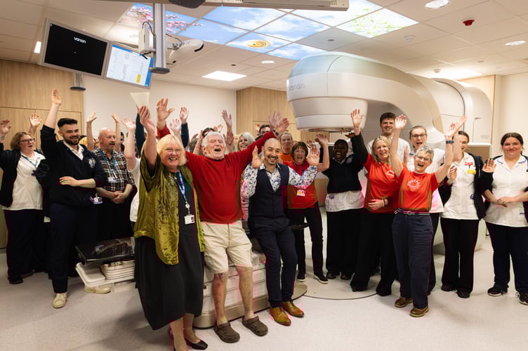 Staff and volunteers at the Sunrise Centre celebrate the arrival of a new Linear Accelerator