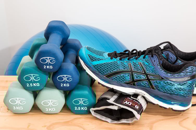 Dumbells, yoga ball and trainer