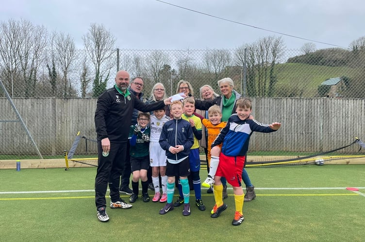 Young footballers have been given money from the pantomime towards new goalposts.