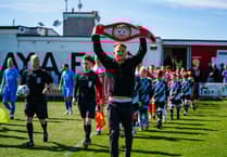 Boxer gets a hero's welcome after major win