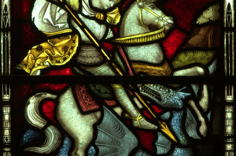 St George slays the dragon, as depicted in stained glass at Truro Cathedral