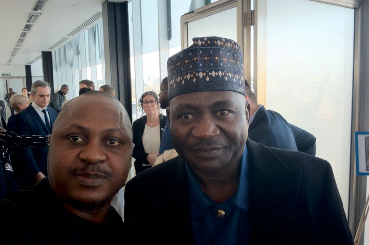 Richard Edoki (left) with the Nigerian Minister of Defence