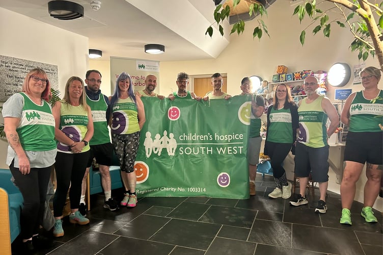 Members of the running group visiting the Little Harbour hospice at Porthpean, St Austell.