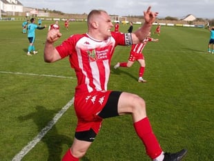 Downing's late header keeps Newquay's season alive