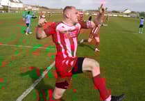 Downing's late header keeps Newquay's season alive