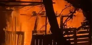 Firefighters scrambled after man-made den caught ablaze