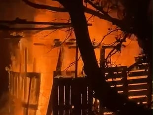 Firefighters scrambled after man-made den caught ablaze