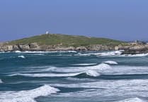 Group rescued after being swept into the sea