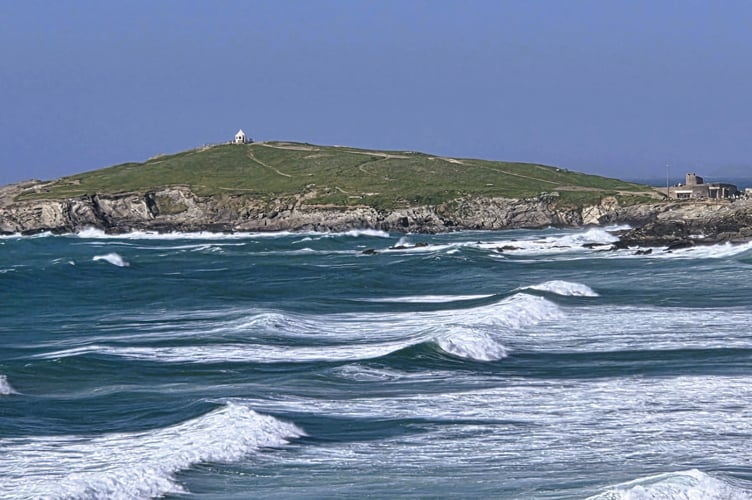 Brisk winds whip up the swell at Fistral.