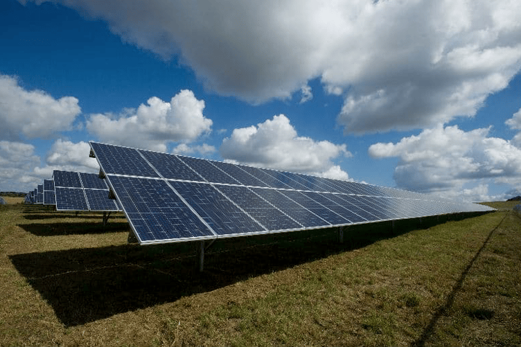 A typical array of photovoltaic panels used in solar farm developments.