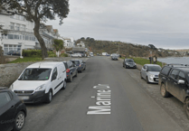 Main road in Looe blocked after car flips onto its roof