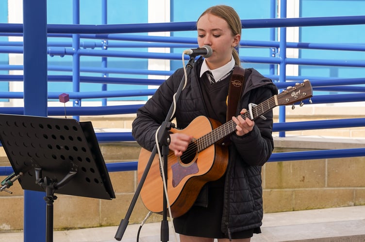 Guests were treated to an acoustic performance by student Esme