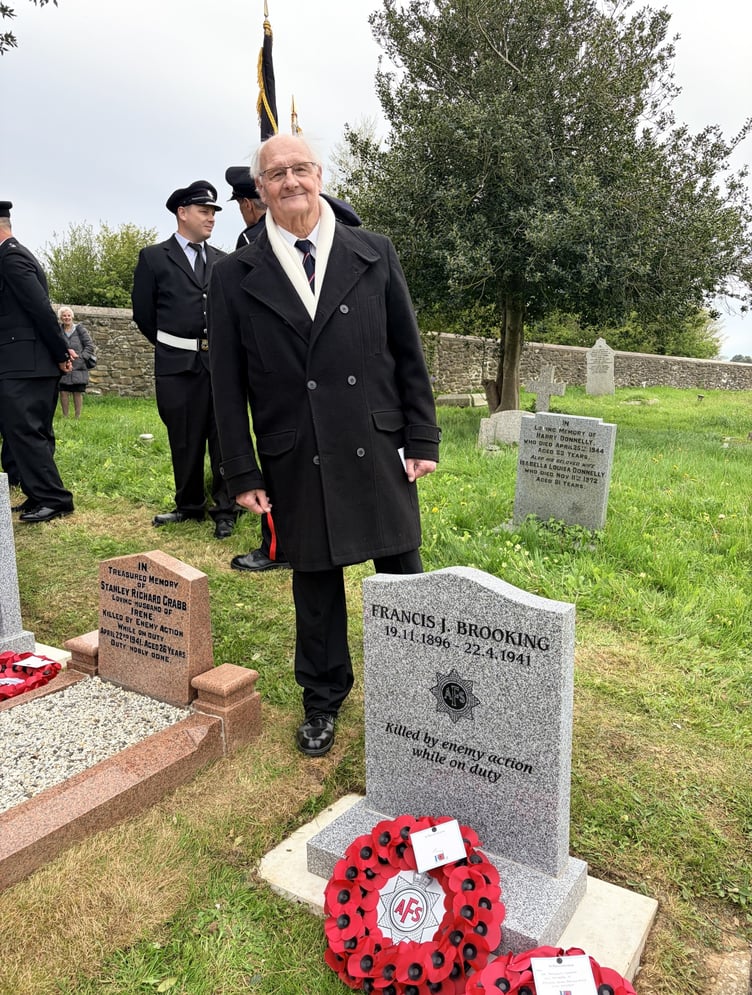 Saltash resident Barry Brooking pictured alongside the headstone of his late grandfather Francis Brooking