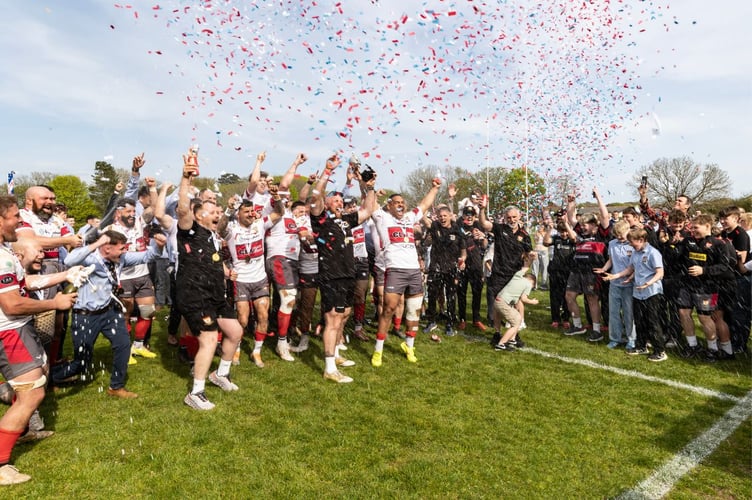 Camborne celebrate promotion.