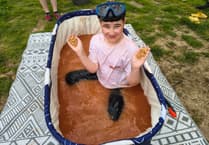 Denny is full of beans after successful fundraising bath