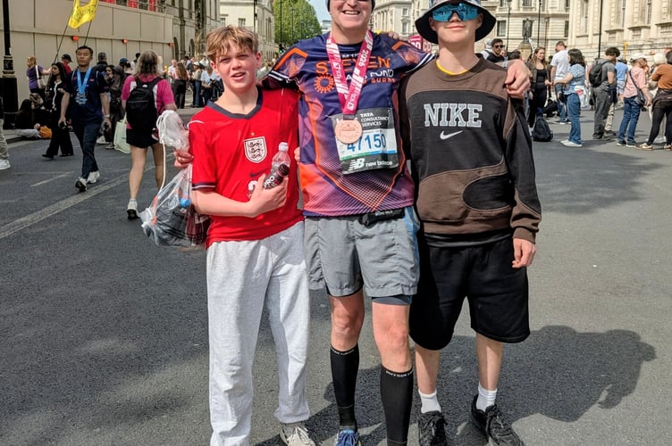 Steven Michell with his sons in London