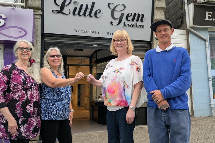 Wendy Harris and Heather Bell hand over the key of Little Gem to Kay and Jake Sparham (Picture: Warren Wilkins)