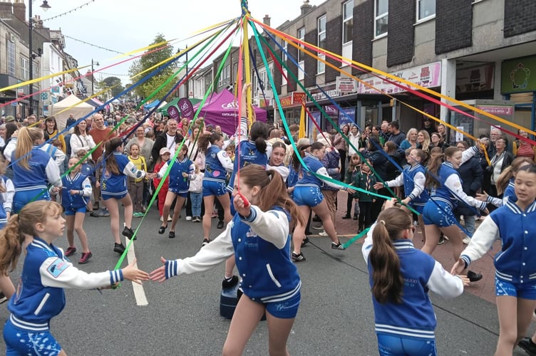 Saltash Fore Street was awash with colour for the annual May Fair celebrations (Picture: Mike Pitches Media)