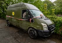 Bodies of man and dog found in van at St Austell lay-by