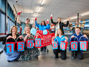 Supermarket giant extends charity pledge after £13m success