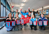 Supermarket giant extends charity pledge after £13m success